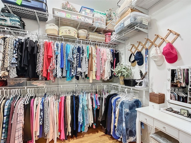 spacious closet with wood finished floors