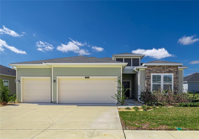 7374 SW 77th Ave, Ocala, FL 34481 - view of front of house featuring an attached garage and concrete driveway