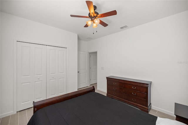 7374 SW 77th Ave, Ocala, FL 34481 - bedroom featuring a closet, baseboards, and ceiling fan