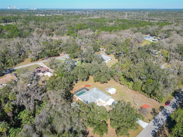 bird's eye view featuring a view of trees