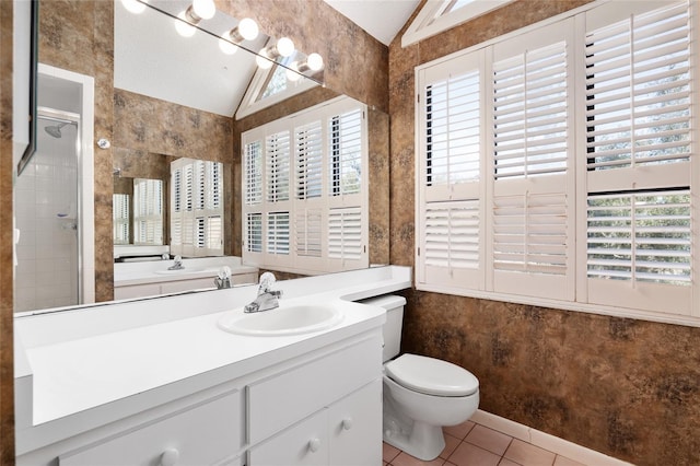 bathroom with lofted ceiling, toilet, tile patterned flooring, an enclosed shower, and vanity