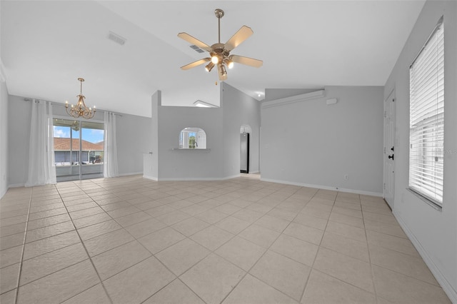 unfurnished living room with light tile patterned floors, baseboards, visible vents, high vaulted ceiling, and ceiling fan with notable chandelier