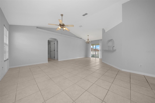 17799 SE 125th Cir, Summerfield, FL 34491 - unfurnished living room with a ceiling fan, arched walkways, lofted ceiling, a chandelier, and baseboards