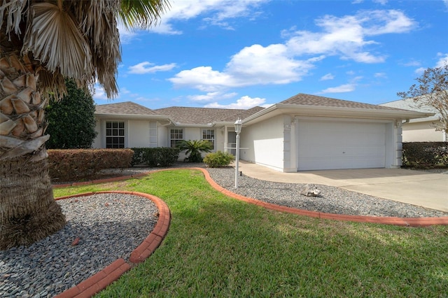 17799 SE 125th Cir, Summerfield, FL 34491 - ranch-style home featuring stucco siding, an attached garage, driveway, and a front yard