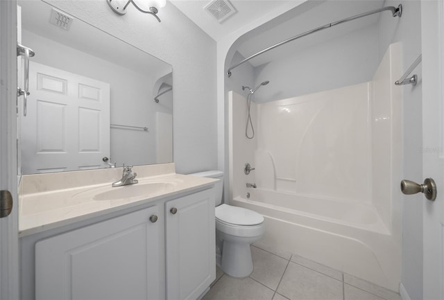 17799 SE 125th Cir, Summerfield, FL 34491 - full bathroom with tile patterned flooring, toilet,  shower combination, and vanity