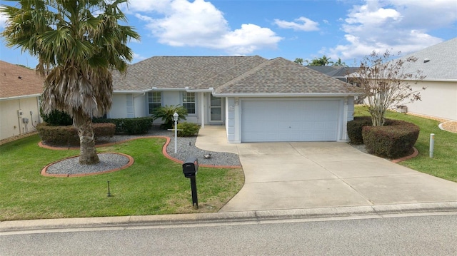 17799 SE 125th Cir, Summerfield, FL 34491 - ranch-style house with an attached garage, concrete driveway, a front lawn, and roof with shingles
