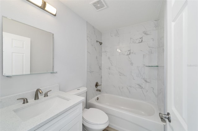 bathroom featuring toilet, visible vents, shower / washtub combination, and vanity