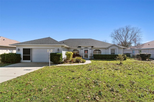 ranch-style home with an attached garage, driveway, a front lawn, and stucco siding