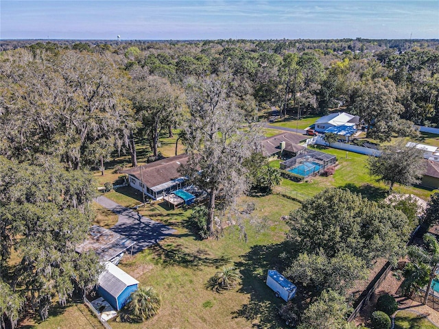 aerial view featuring a view of trees