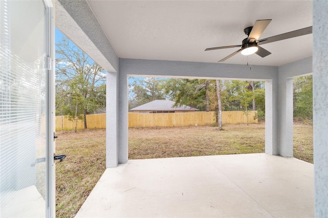 view of patio / terrace with a fenced backyard and a ceiling fan