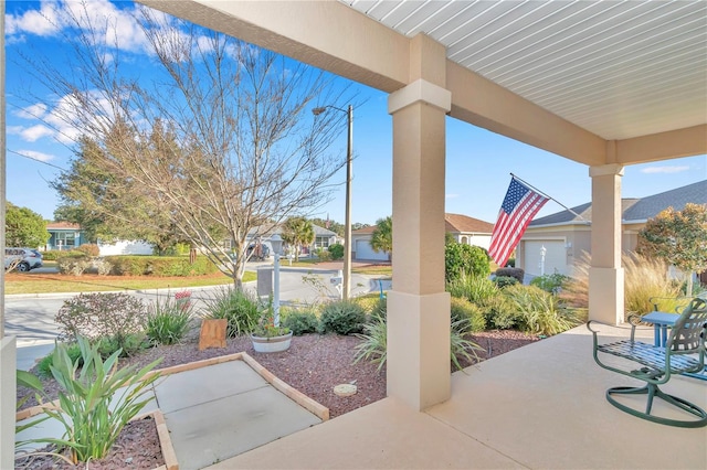 view of patio / terrace with a residential view