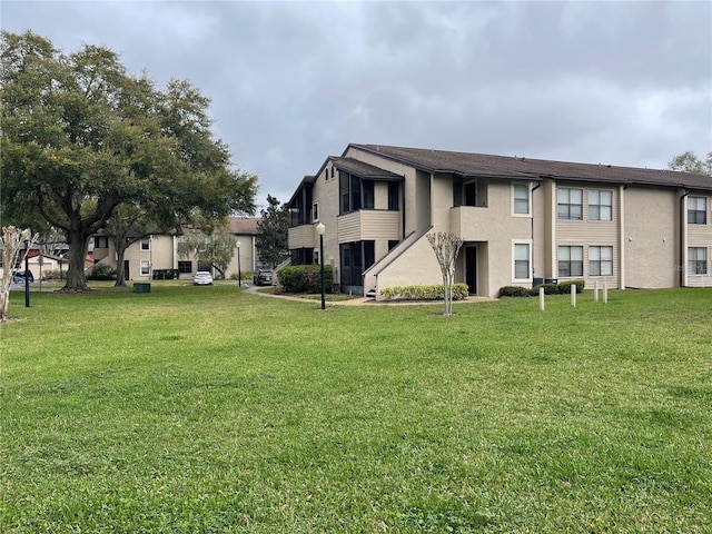 exterior space featuring a lawn