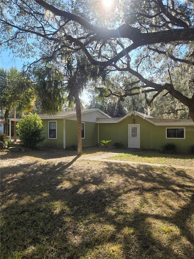 view of home's exterior featuring a yard