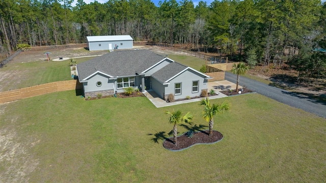 aerial view with a wooded view