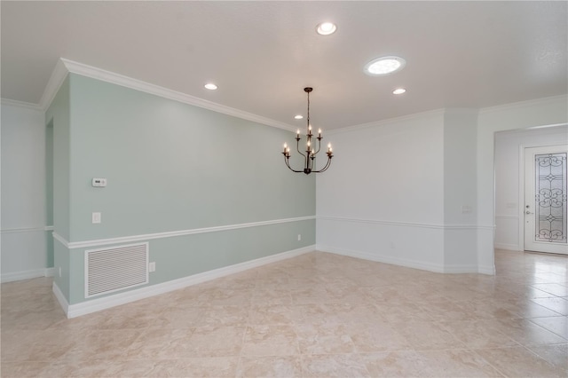 empty room with visible vents, crown molding, a notable chandelier, and baseboards