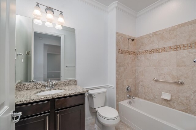 bathroom featuring toilet, bathtub / shower combination, ornamental molding, and vanity