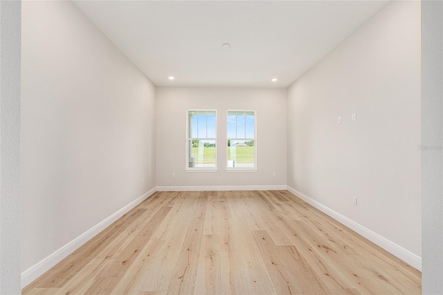 1929 NW 85th Loop, Ocala, FL 34475 - unfurnished room with wood finished floors and recessed lighting