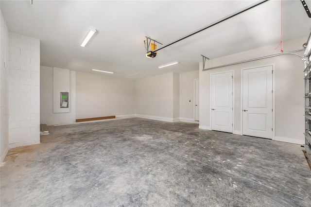1929 NW 85th Loop, Ocala, FL 34475 - garage with a garage door opener and electric panel