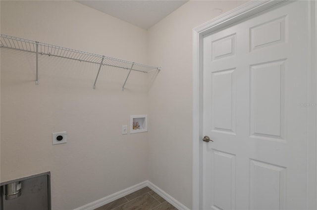 laundry room with laundry area, baseboards, washer hookup, and hookup for an electric dryer