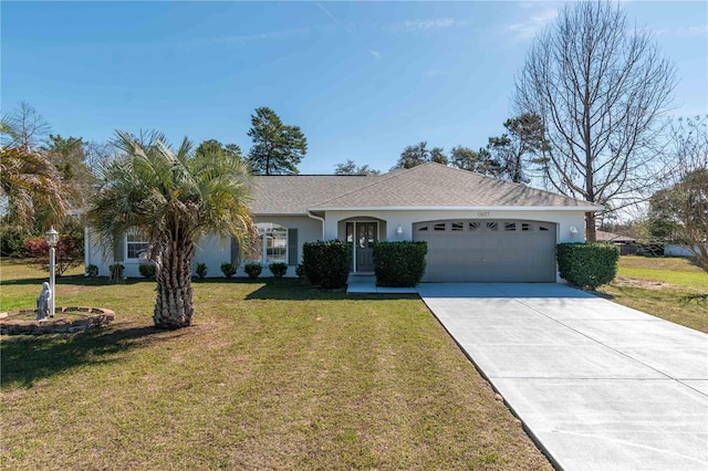 ranch-style house featuring an attached garage, stucco siding, concrete driveway, and a front yard