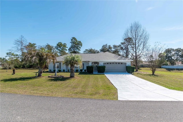 ranch-style home featuring an attached garage, driveway, and a front yard