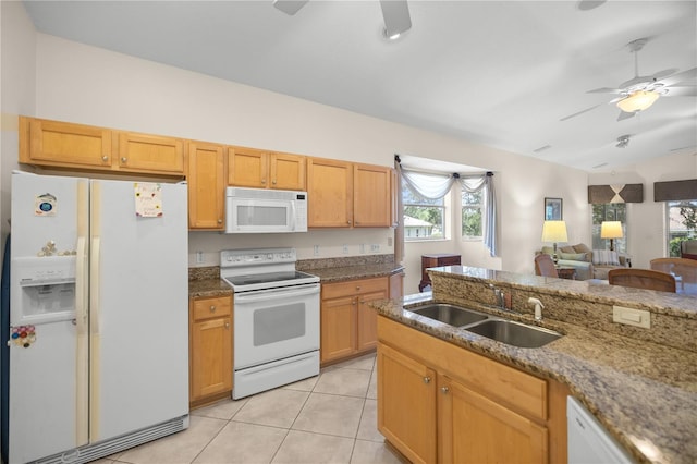 kitchen with ceiling fan, white appliances, light tile patterned floors, and a sink