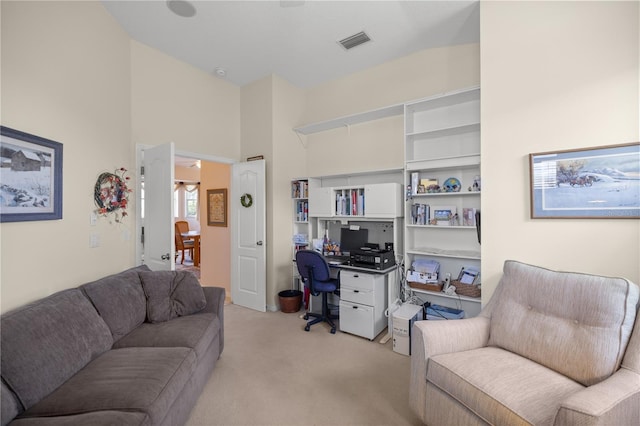 office space featuring light colored carpet and visible vents