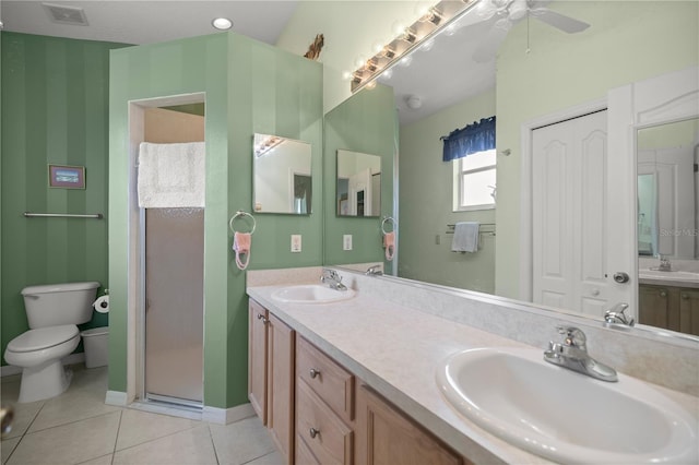 bathroom featuring a closet, visible vents, and a sink