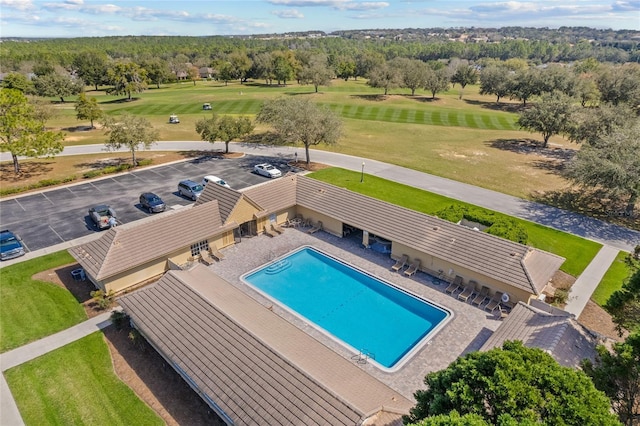 view of pool with an enclosed area