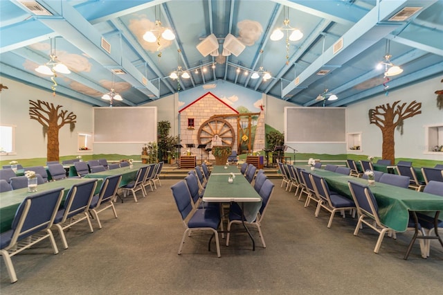 dining space featuring high vaulted ceiling, beam ceiling, and visible vents