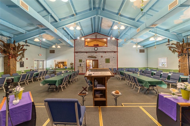 recreation room with high vaulted ceiling, visible vents, and beamed ceiling