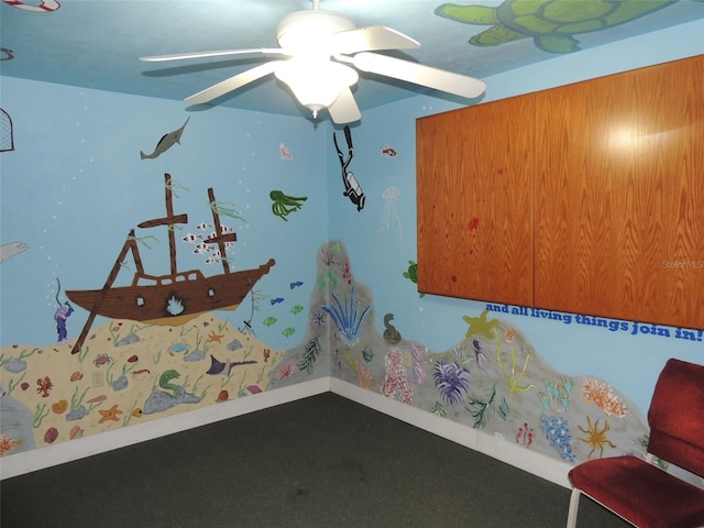 unfurnished bedroom featuring ceiling fan and baseboards