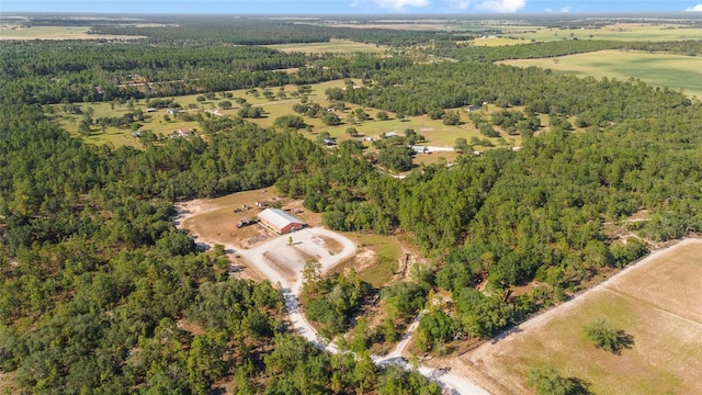 aerial view featuring a forest view