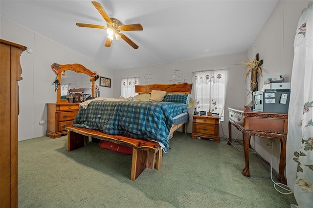 carpeted bedroom with a ceiling fan