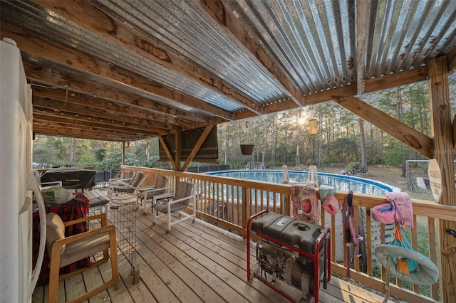 wooden deck with an outdoor pool