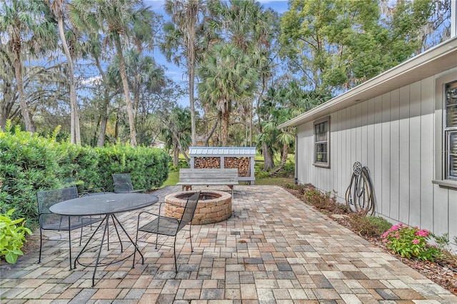 view of patio / terrace with a fire pit