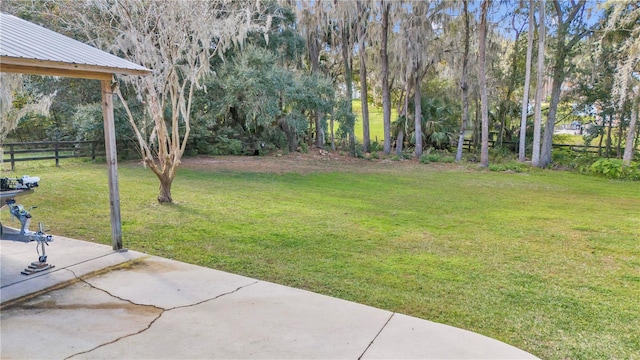 view of yard featuring a patio area and fence