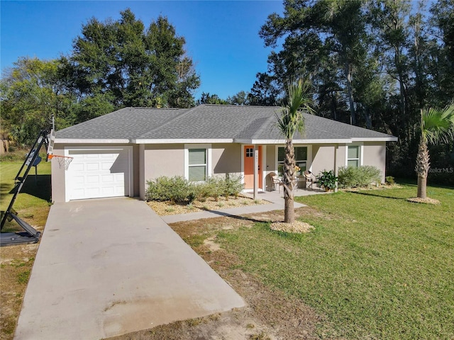 ranch-style house featuring a shingled roof, concrete driveway, stucco siding, an attached garage, and a front yard