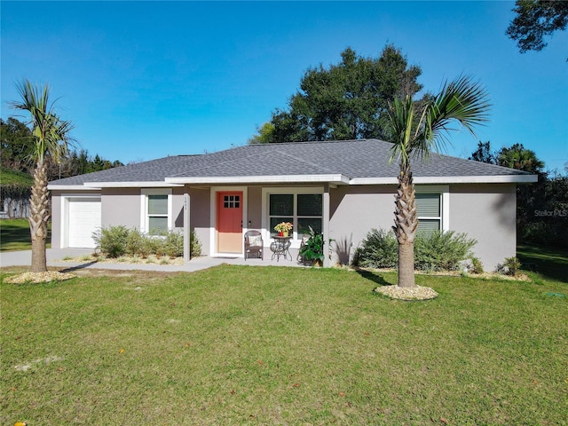 ranch-style house with a garage, a shingled roof, a front lawn, and stucco siding