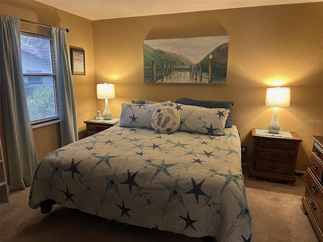 bedroom featuring light colored carpet and multiple windows