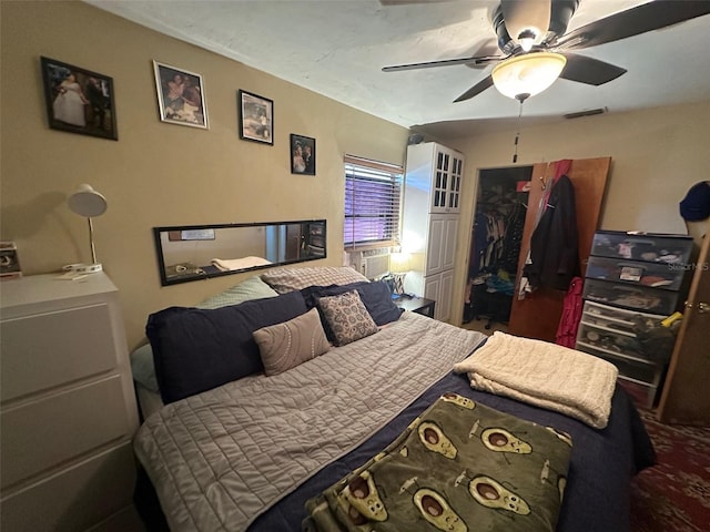 bedroom featuring visible vents and ceiling fan