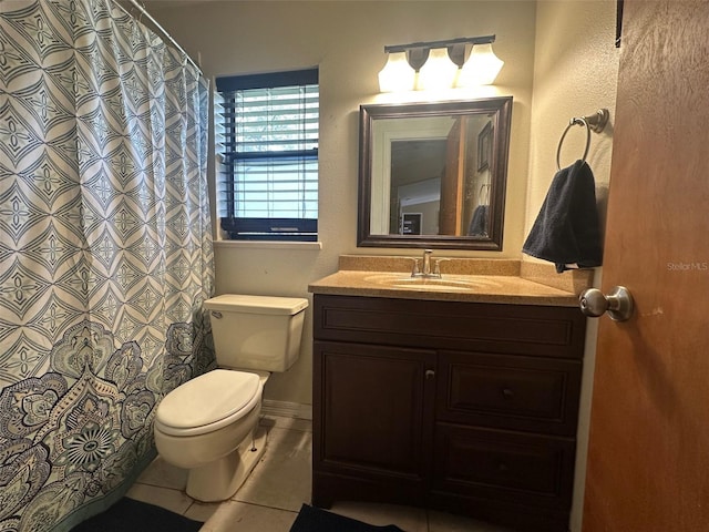 full bath with toilet, tile patterned flooring, and vanity