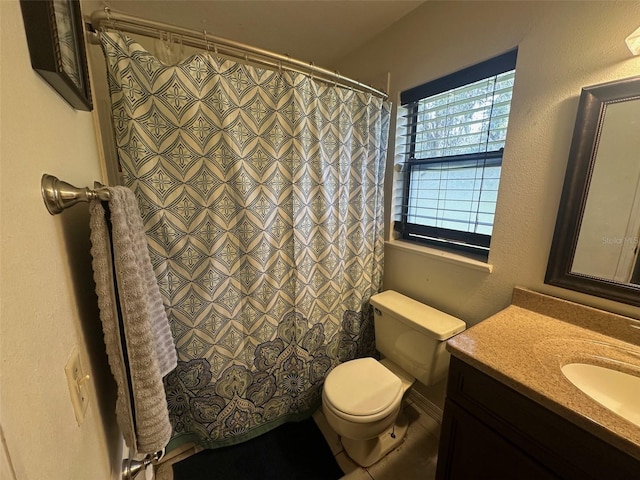 full bath with vanity and toilet