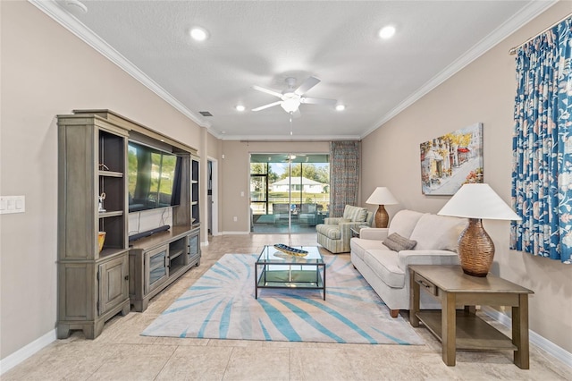 living room with visible vents, ornamental molding, ceiling fan, a textured ceiling, and baseboards