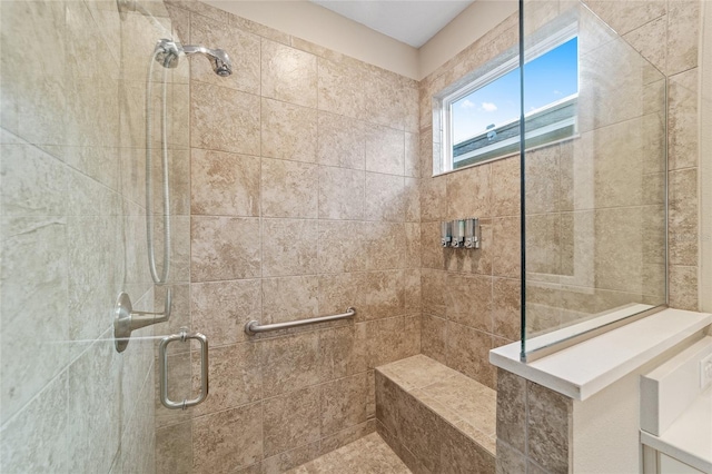 full bathroom with a tile shower