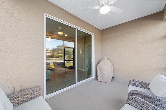 sunroom / solarium with ceiling fan