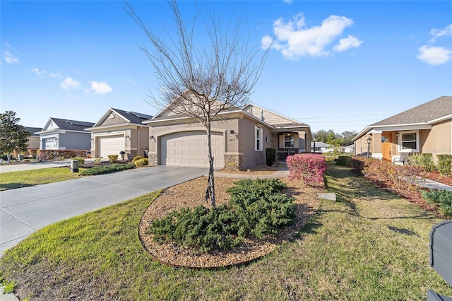 view of front of home featuring a front yard, driveway, an attached garage, and stucco siding