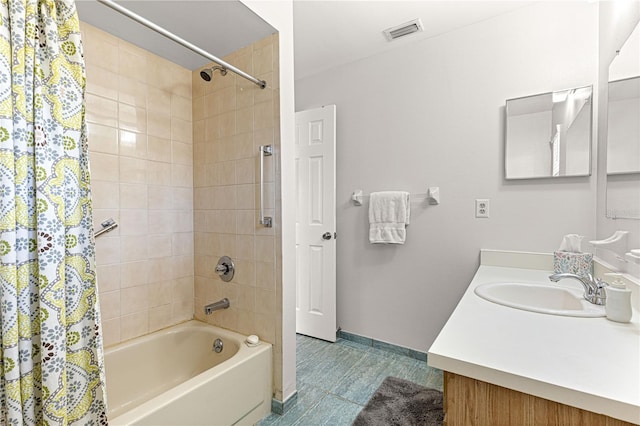 full bath featuring shower / tub combo, baseboards, visible vents, tile patterned flooring, and vanity