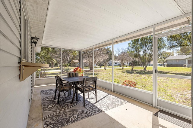 sunroom featuring a healthy amount of sunlight