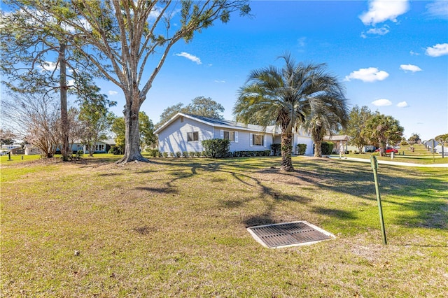 exterior space with a lawn